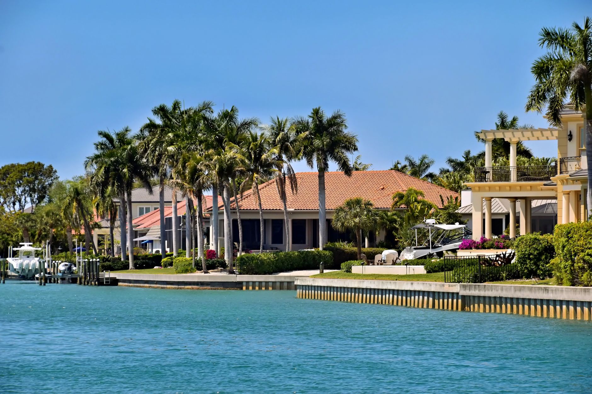 Elegant luxury homes featuring modern architecture, spacious interiors, and stunning waterfront views.